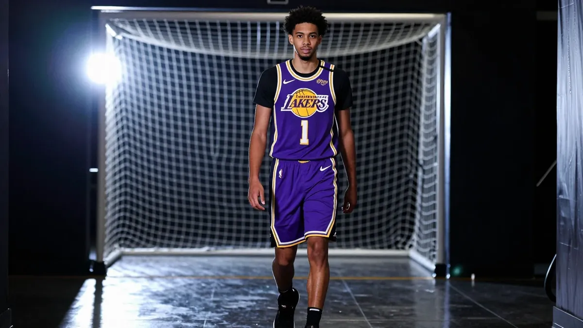 The Los Angeles Lakers reveal their new Specter alternate jerseys, featuring a purple, black, and yellow colorway and a...